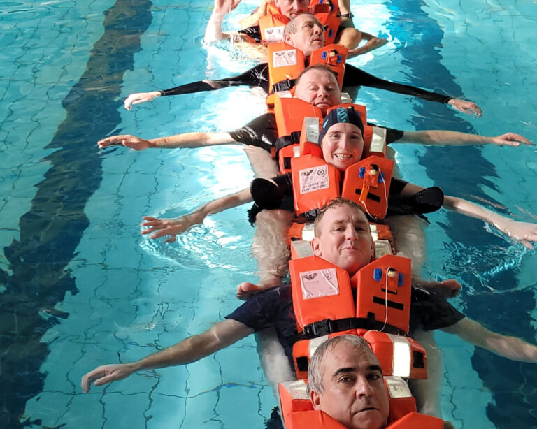 "Instructors leading a maritime training course."